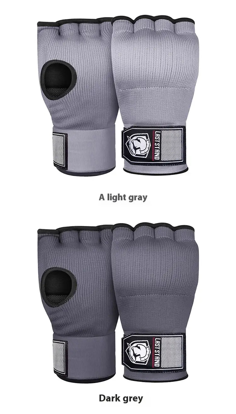 Light gray and dark grey gel boxing hand wrap gloves with black trim featuring breathable mesh fabric and branded wrist straps designed for fitness use.