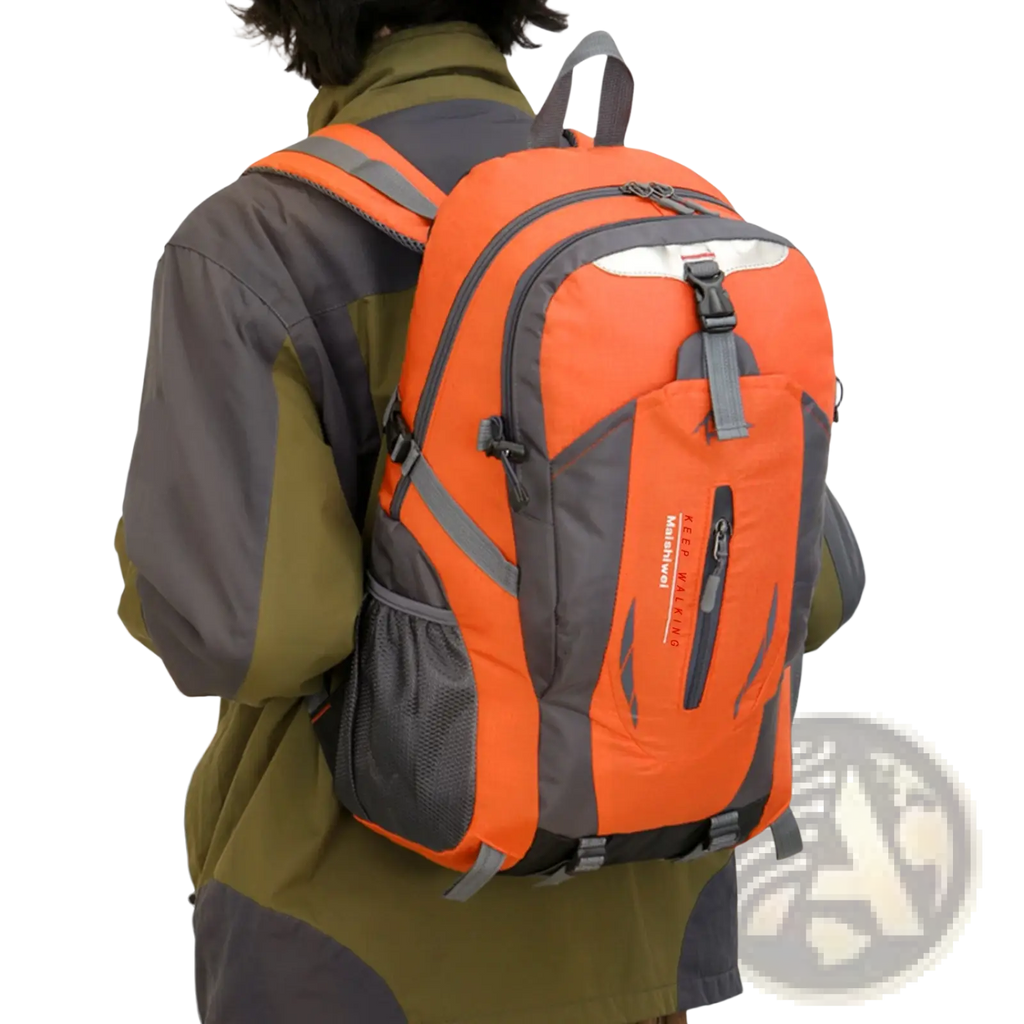 Bright orange and gray 36l lightweight waterproof hiking backpack with reflective stripes and keep walking logo