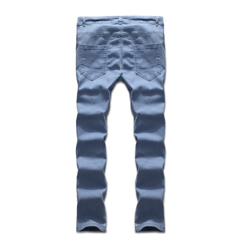 Les jeans en denim délavé clair à coupe slim, effet vieilli, présentent un denim bleu clair à coupe slim, un délavage dégradé et des coutures visibles.