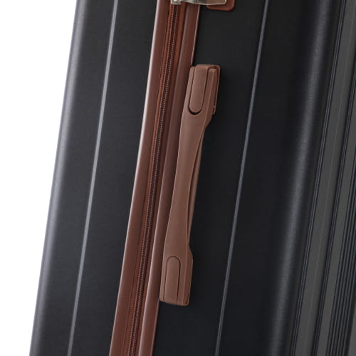 Black hard-shell abs spinner suitcase with brown leather handle and zipper pull featuring tsa lock from a 3 piece luggage set