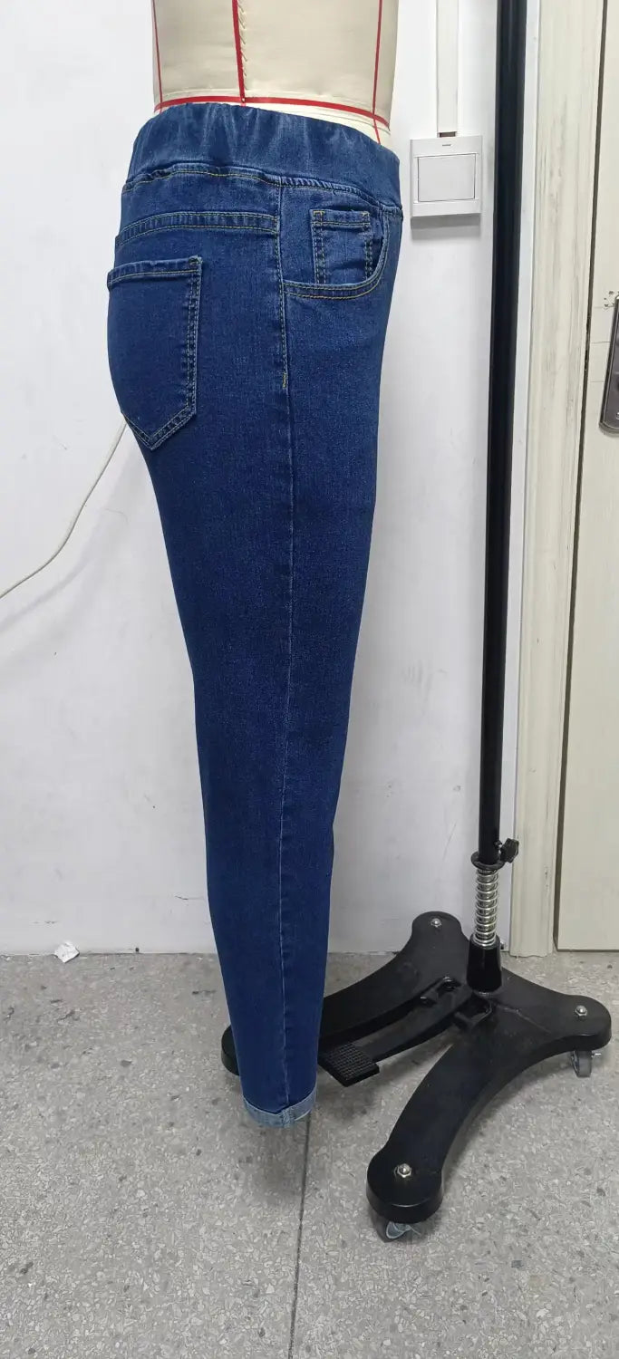 high waist slim denim leggings in blue denim with a slim fit and elastic waistband for comfortable wear