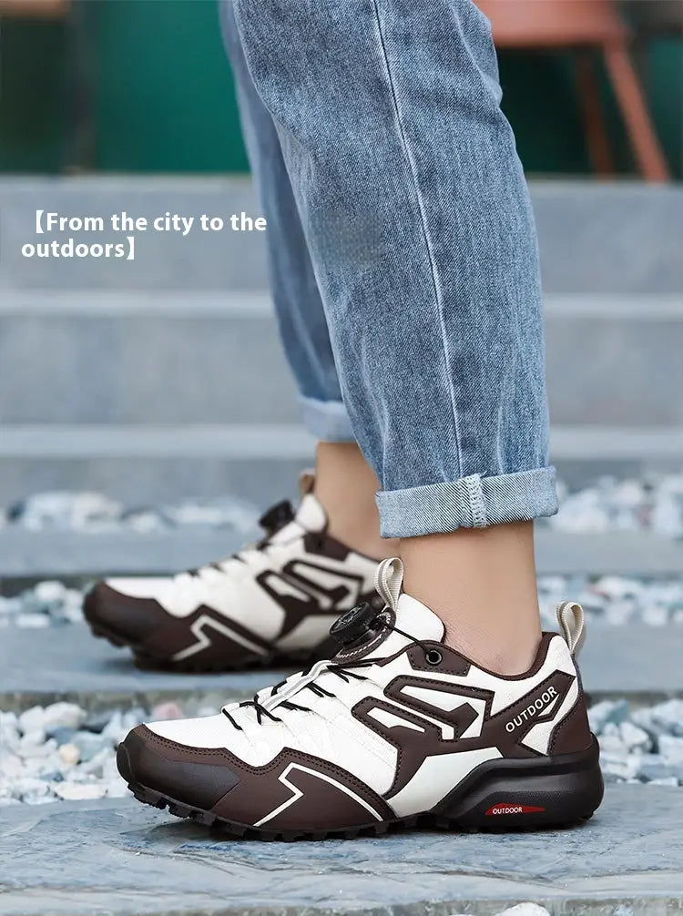 White and brown Salomon X111 lightweight off-road breathable hiking shoes with a rugged design for outdoor use.