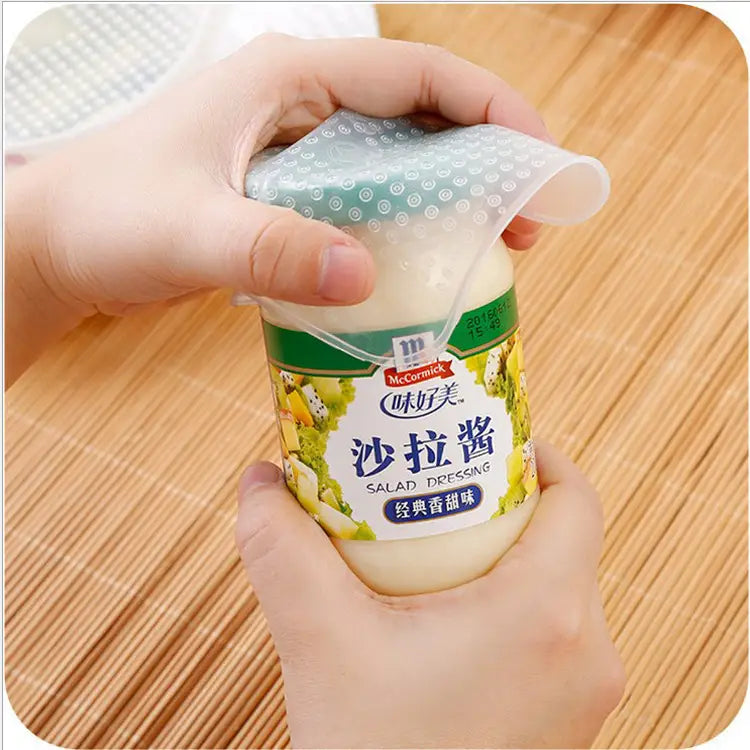 Couvercle extensible en silicone transparent avec un motif de points assurant l’étanchéité d’une bouteille de vinaigrette McCormick, couvercle de conservation des aliments réutilisable, ensemble de 4 pièces.