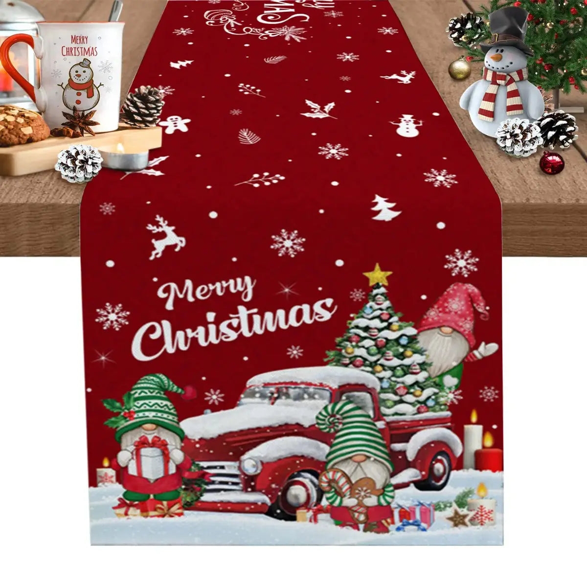 red christmas-themed table runner measuring 183x33 inches featuring festive gnomes, a snow-covered truck, and holiday decorations on a printed fabric surface.