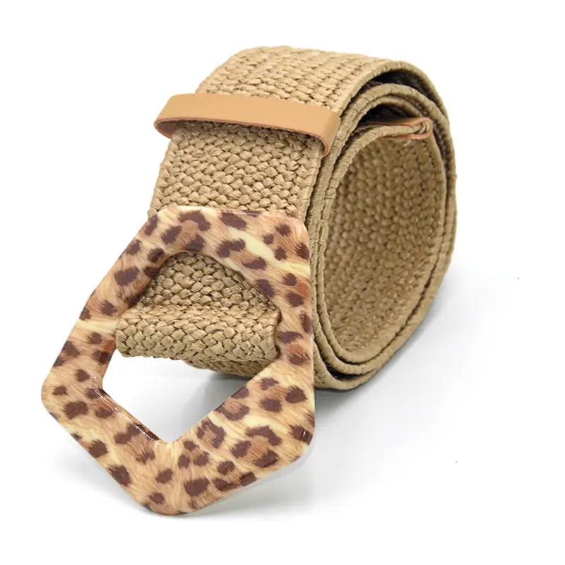 Beige woven elastic belt with a hexagonal leopard print buckle made of woven material.