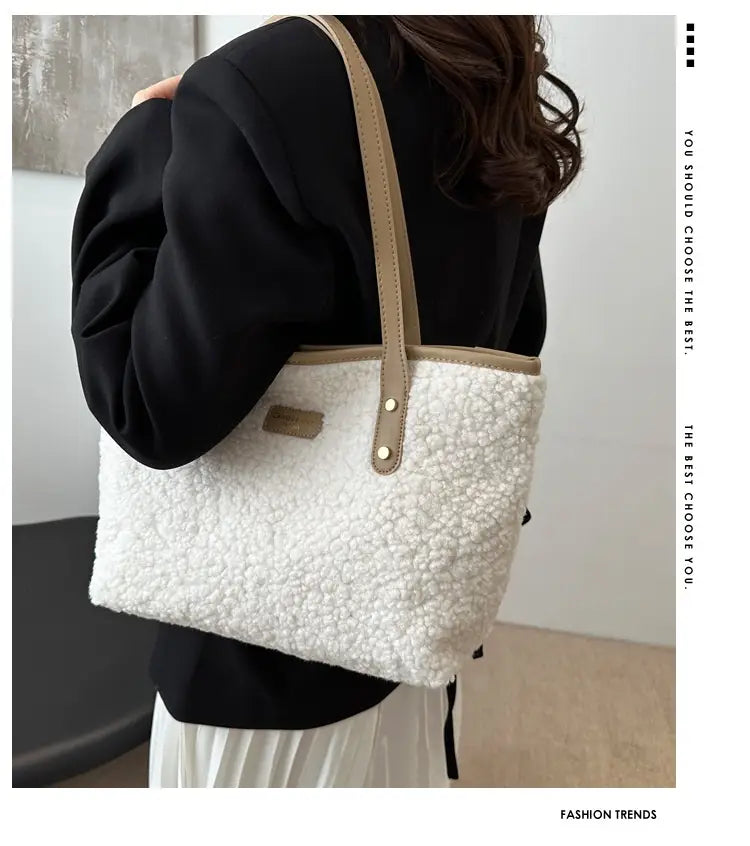 Brown faux fur tote bag featuring white fluffy texture with beige leather straps and gold-tone hardware