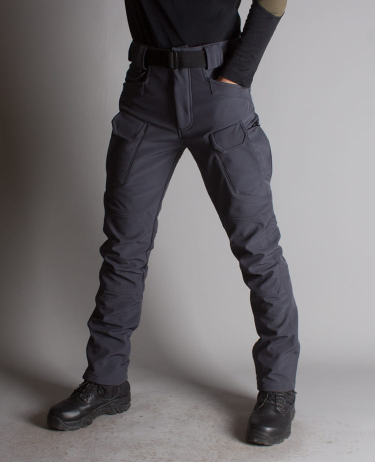 Ix7 mens fleece lined tactical pants in dark gray featuring multiple cargo pockets and a sturdy belt loop design.