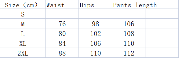 The table displays size measurements for men’s black ruched glossy faux leather tapered pants including waist hip and pant length in centimeters from size s to 2xl.