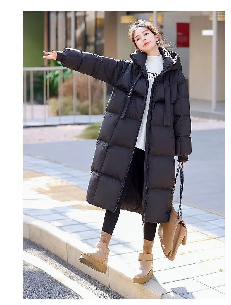 black quilted down long hooded puffer coat for women with front zipper closure