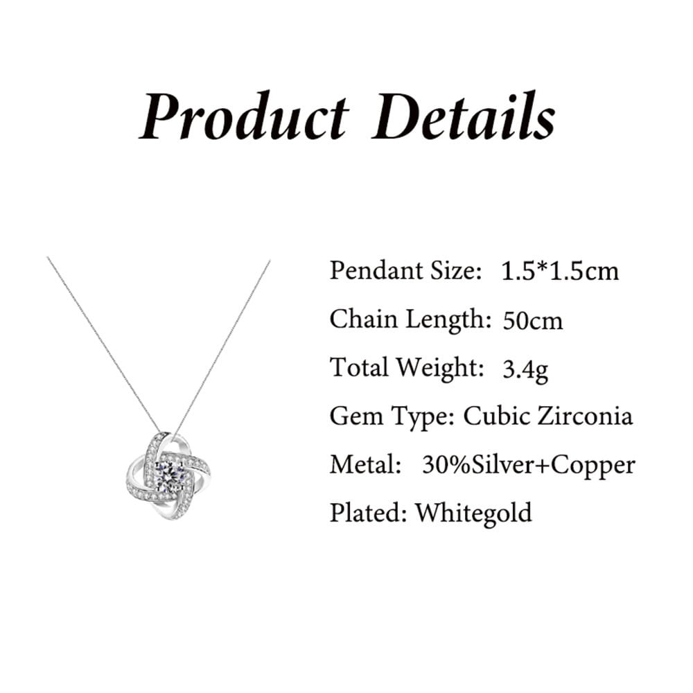 Eternal Rose Apple Jewelry Box with hidden necklace drawer displaying a delicate white gold-plated necklace featuring a swirling knot pendant adorned with cubic zirconia stones.