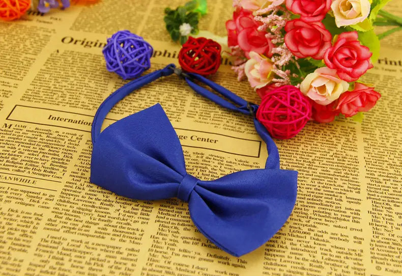 Collar para mascotas con lazo de color sólido ajustable, con clip accesorio para cabello de rosa tejida azul.