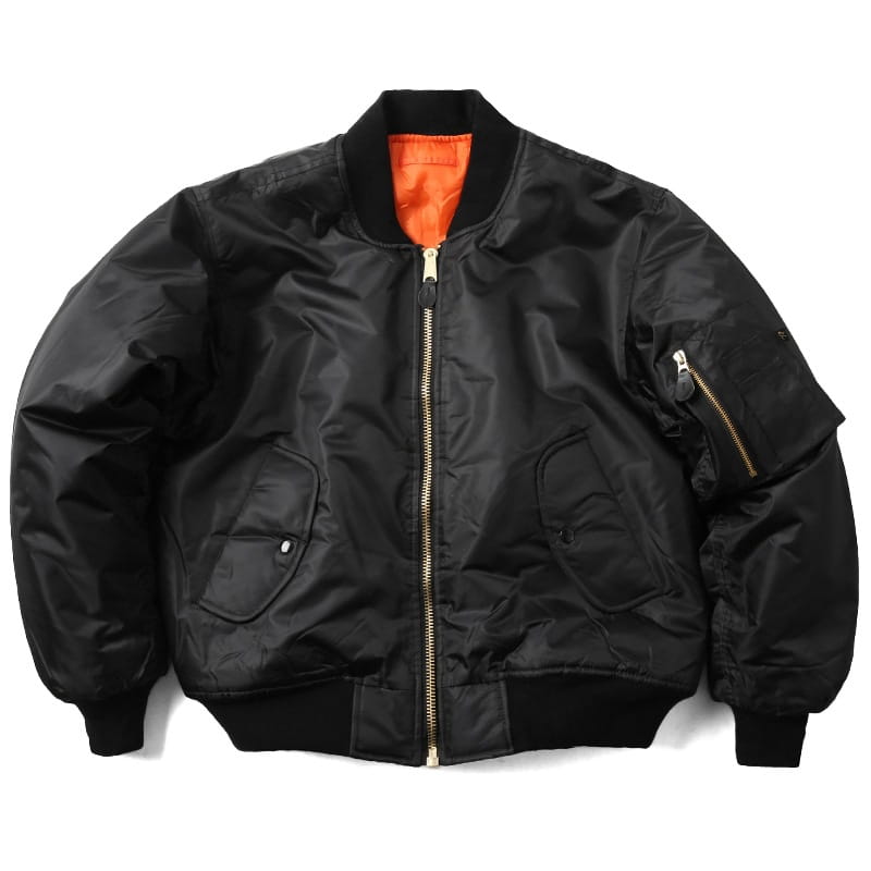 men’s pilot cotton bomber jacket in black features a vibrant orange lining and gold-toned zipper accents.