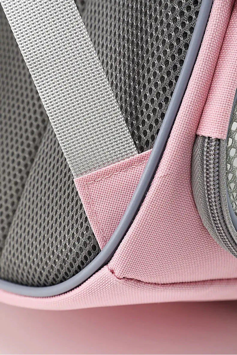 small animal travel backpack transparent pink carrier featuring pink and gray mesh with reinforced fabric straps shown from the back side