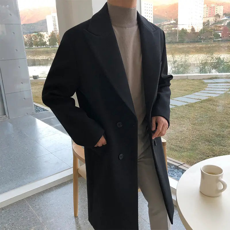 Black wool men overcoat with double-breasted design, tailored fit, and classic lapel for winter wear.