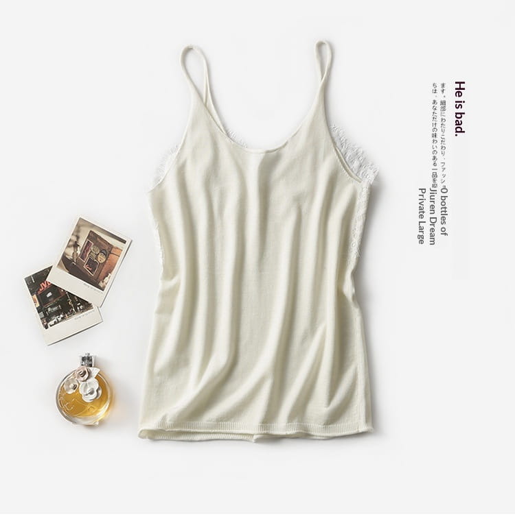Cream-colored lace trim camisole top made of delicate fabric with spaghetti straps suitable for layering or casual wear
