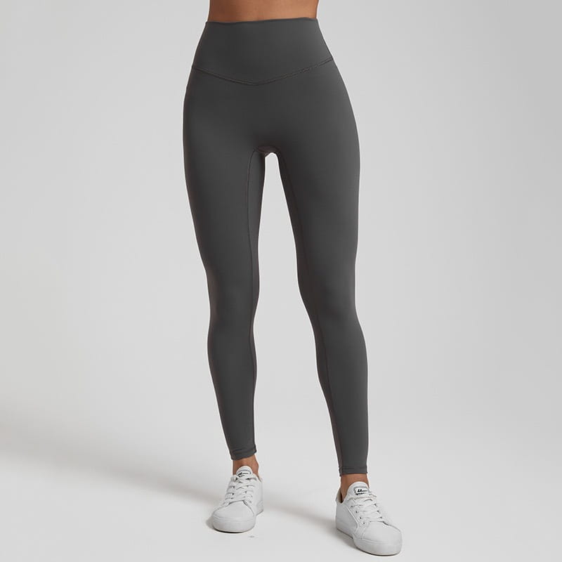 Dark gray high waisted stretch fitted leggings made from smooth stretchy fabric designed for comfortable wear.