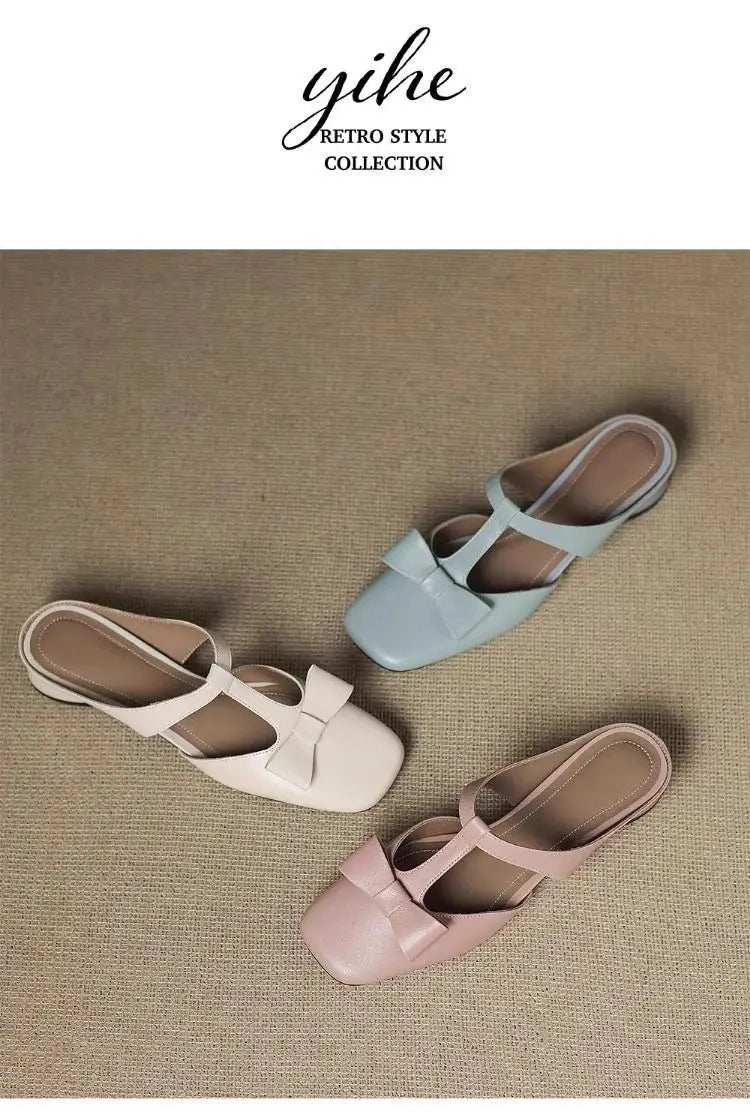 Pastel-colored square-toe leather mule flats for women featuring bow accents on the closed toe.