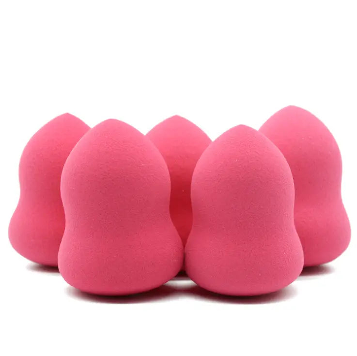 Bright pink teardrop makeup sponges made of soft hydrophilic foam in a 2 pack for smooth foundation application.
