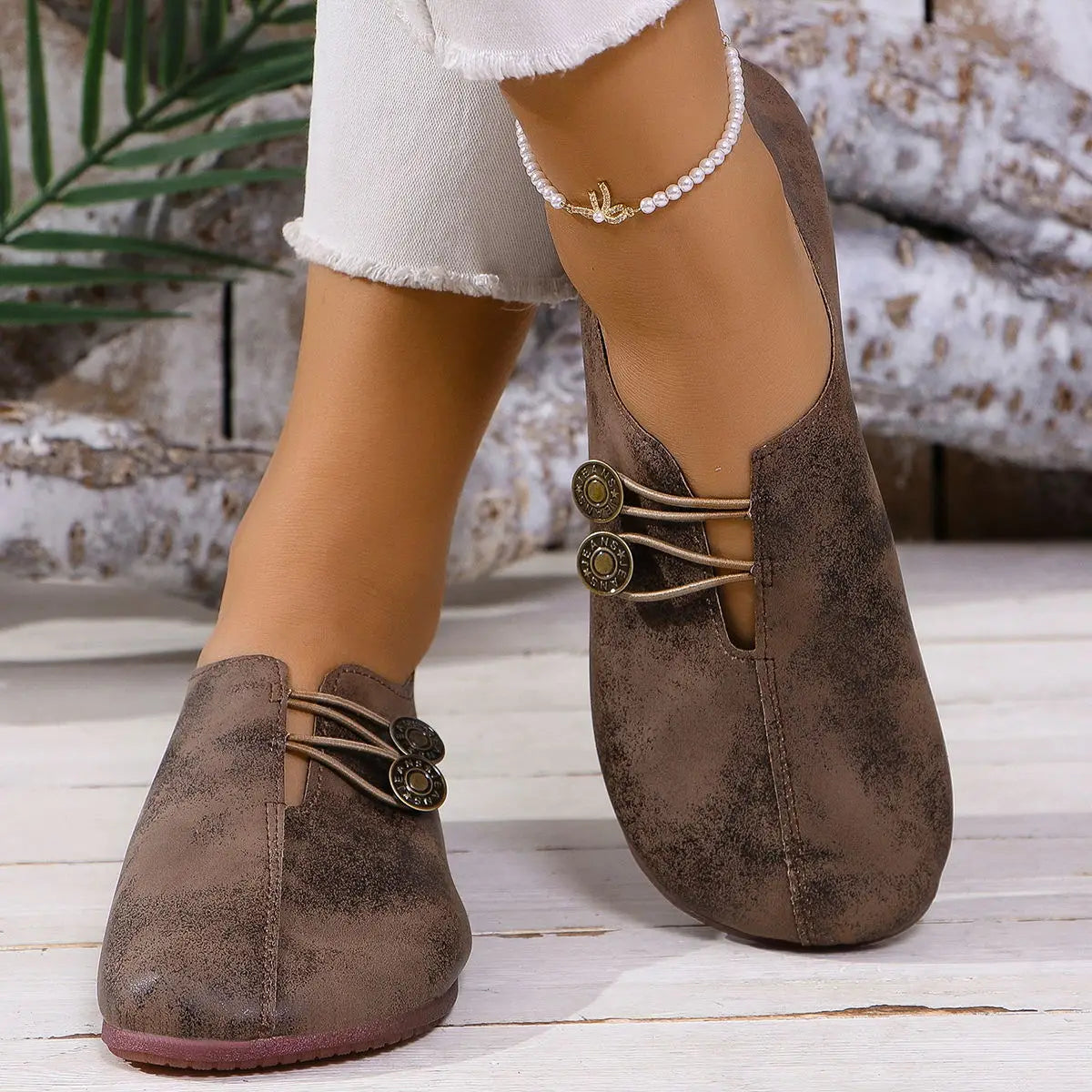 women’s square toe lace-up leather and suede loafers in brown suede with decorative metal buttons and laces