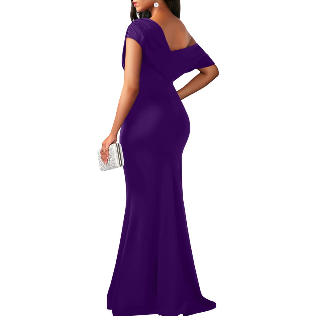 off the shoulder mermaid evening gown in deep purple with a form-fitting draped bodice, short sleeves, and a backless design shown from the back.