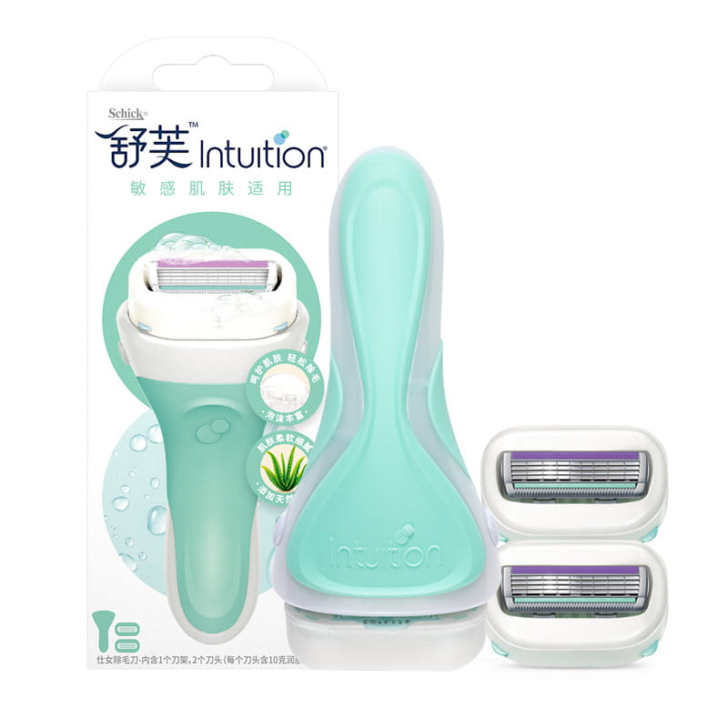 Mint green and white Schick Intuition women’s razor with two replacement blades in a hair trimmer and razor set designed for sensitive skin.