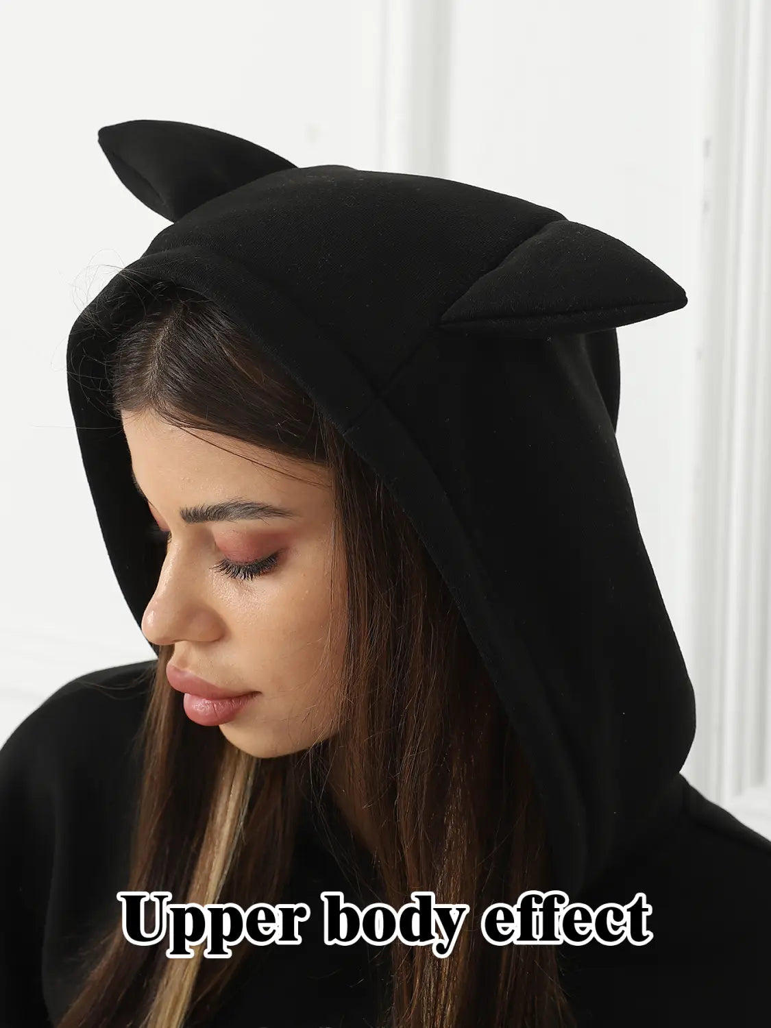 women’s dalmatian print hoodie in black featuring a plush cat ear hood shown from the back