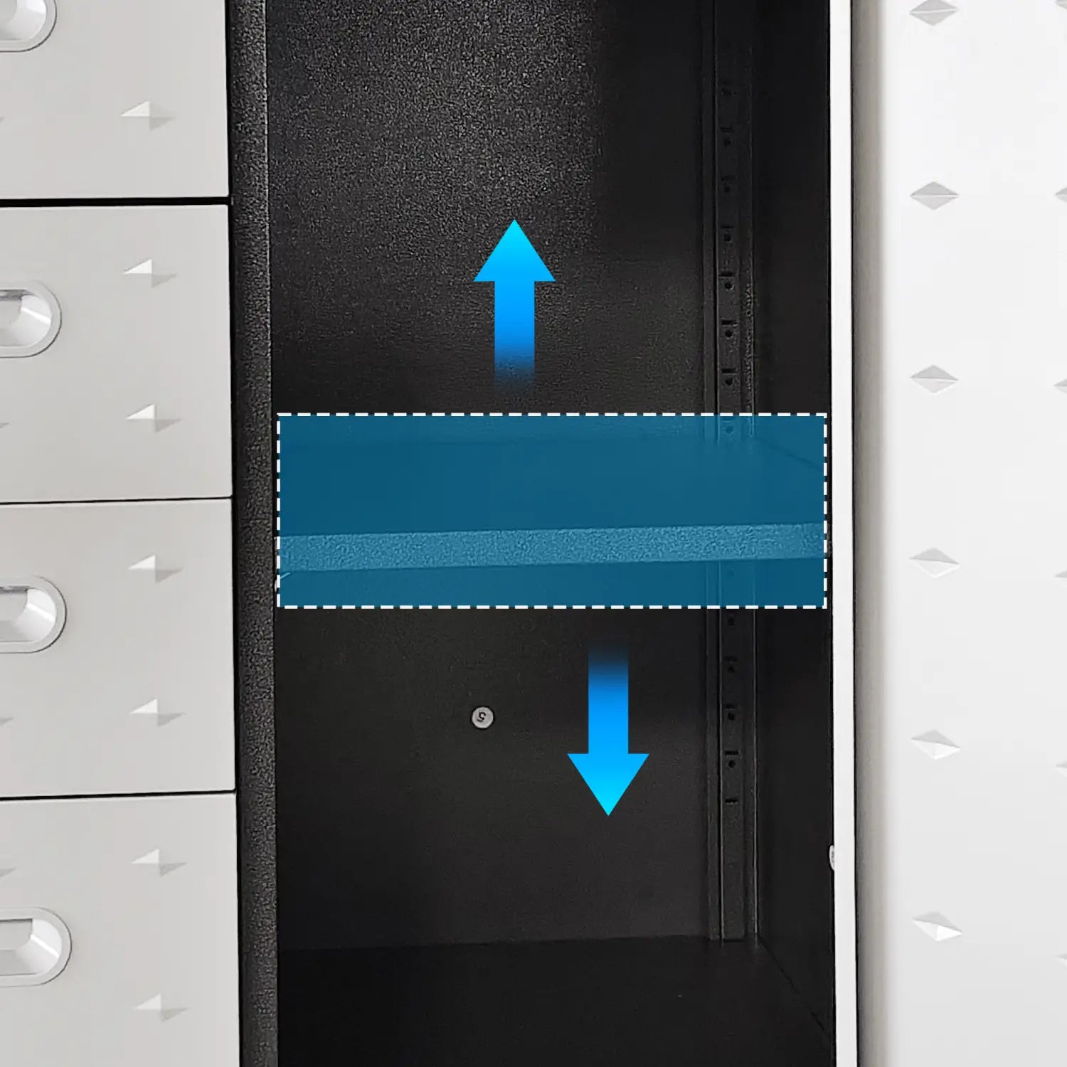 black interior of the back side of a gray metal tool storage cabinet with wheels and four drawers showing blue arrows indicating airflow direction