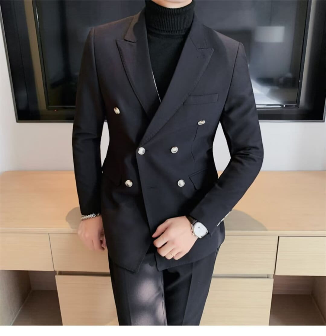 Black double-breasted suit jacket with silver buttons and a tailored fit showcasing a formal menswear option distinct from the teal double-breasted corduroy jacket.