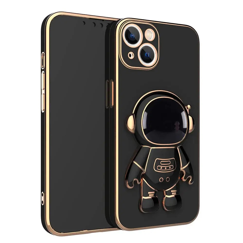Black astronaut-themed electroplated phone case with gold trim and 3D standing figure on the back side