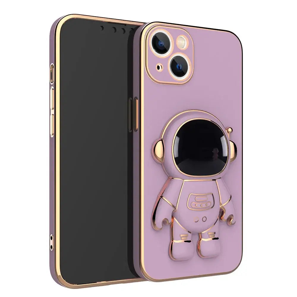 Back side of a lavender astronaut-themed electroplated anti-drop phone case with gold trim and 3D standing figure stand