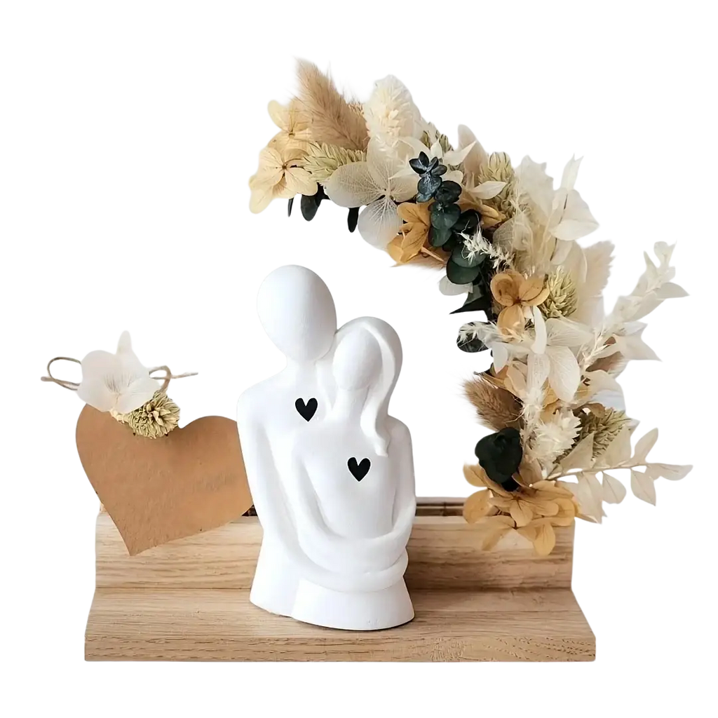 White ceramic couple figurine with black heart details shown as 3d couple hug silicone candle mold product design