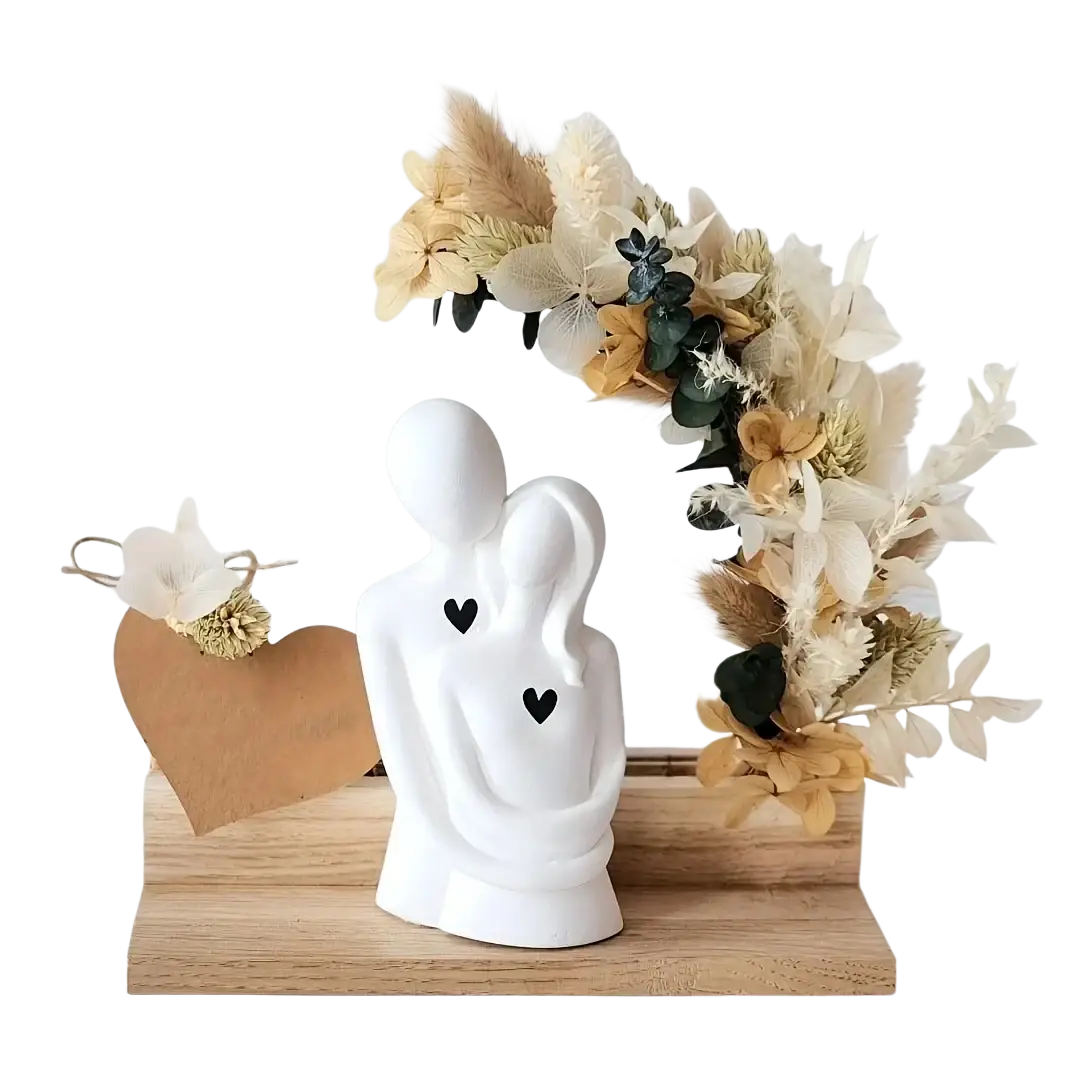 White ceramic couple figurine with black heart details shown as 3d couple hug silicone candle mold product design