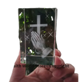 Clear crystal block 3d statue featuring an engraved cross and praying hands design in transparent crystal material