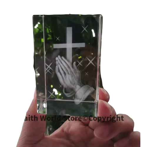 Clear crystal block 3d statue featuring an engraved cross and praying hands design in transparent crystal material