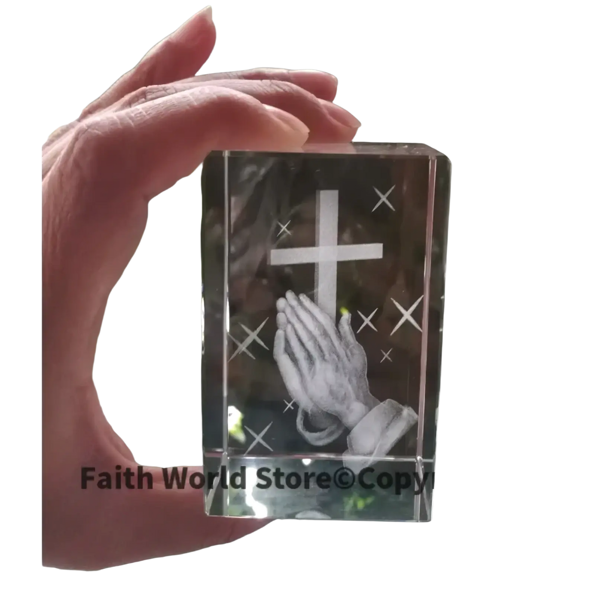 Clear crystal cross praying hands statue featuring engraved cross and praying hands with starburst details