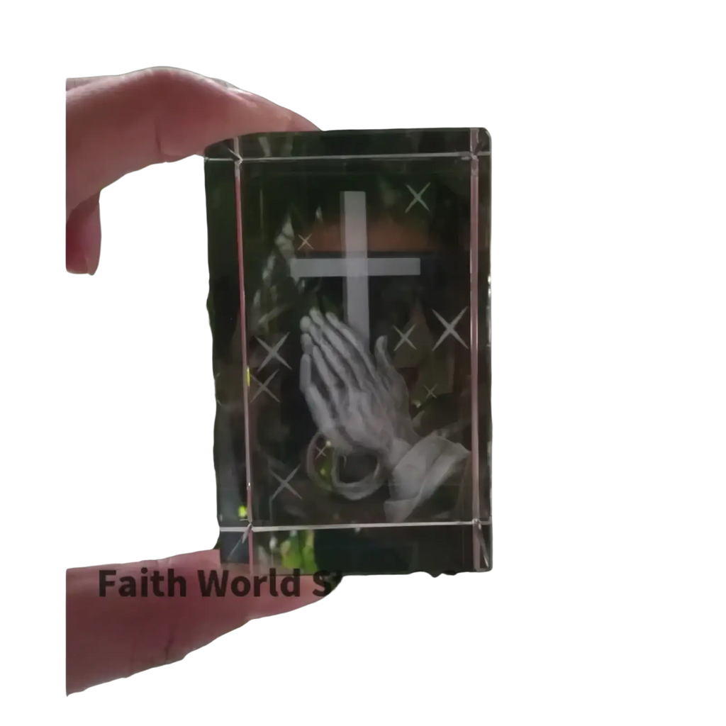 Clear crystal cross praying hands statue featuring an engraved cross and praying hands design inside a crystal box