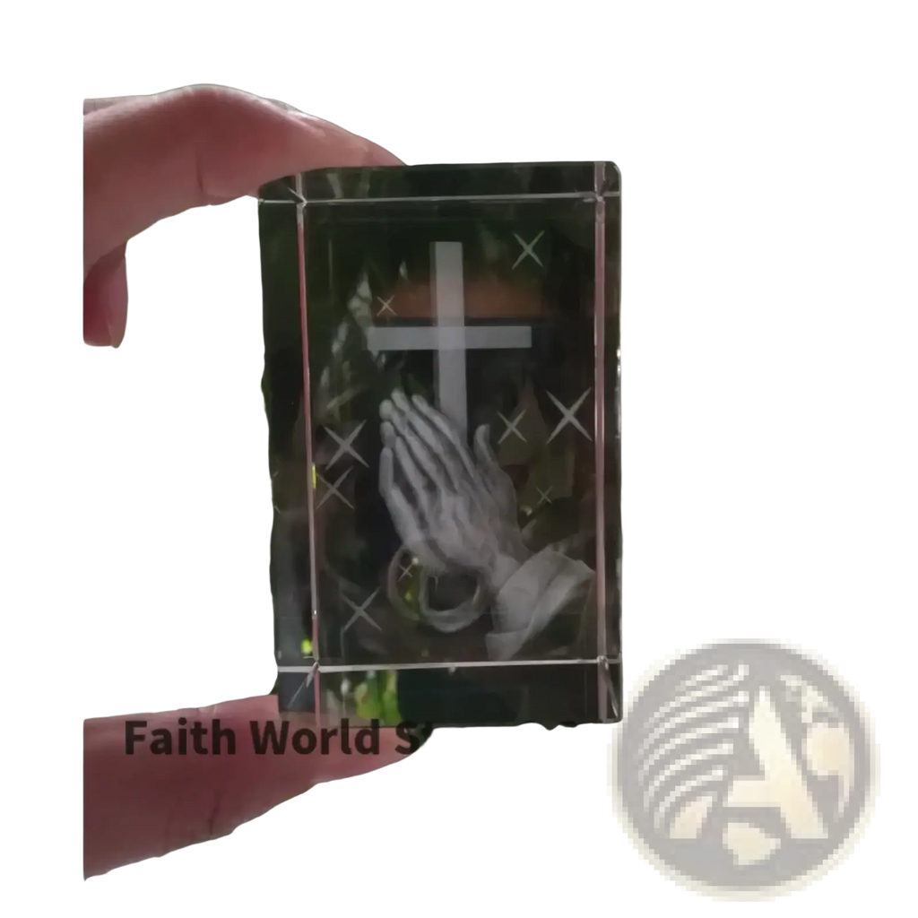 Clear crystal cross praying hands statue featuring an engraved cross and praying hands design inside a crystal box
