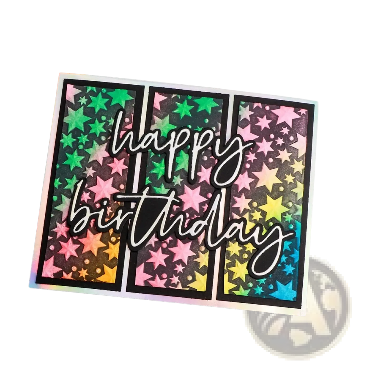 A vibrant rainbow-hued 3d floral embossing folder for card making featuring a starry design and white cursive lettering