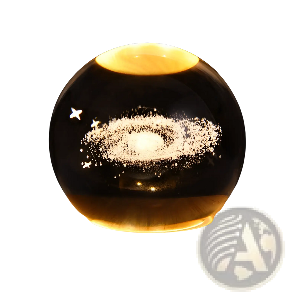 A glowing transparent glass 3d galaxy crystal ball led night light moon lamp illuminated by warm yellow light