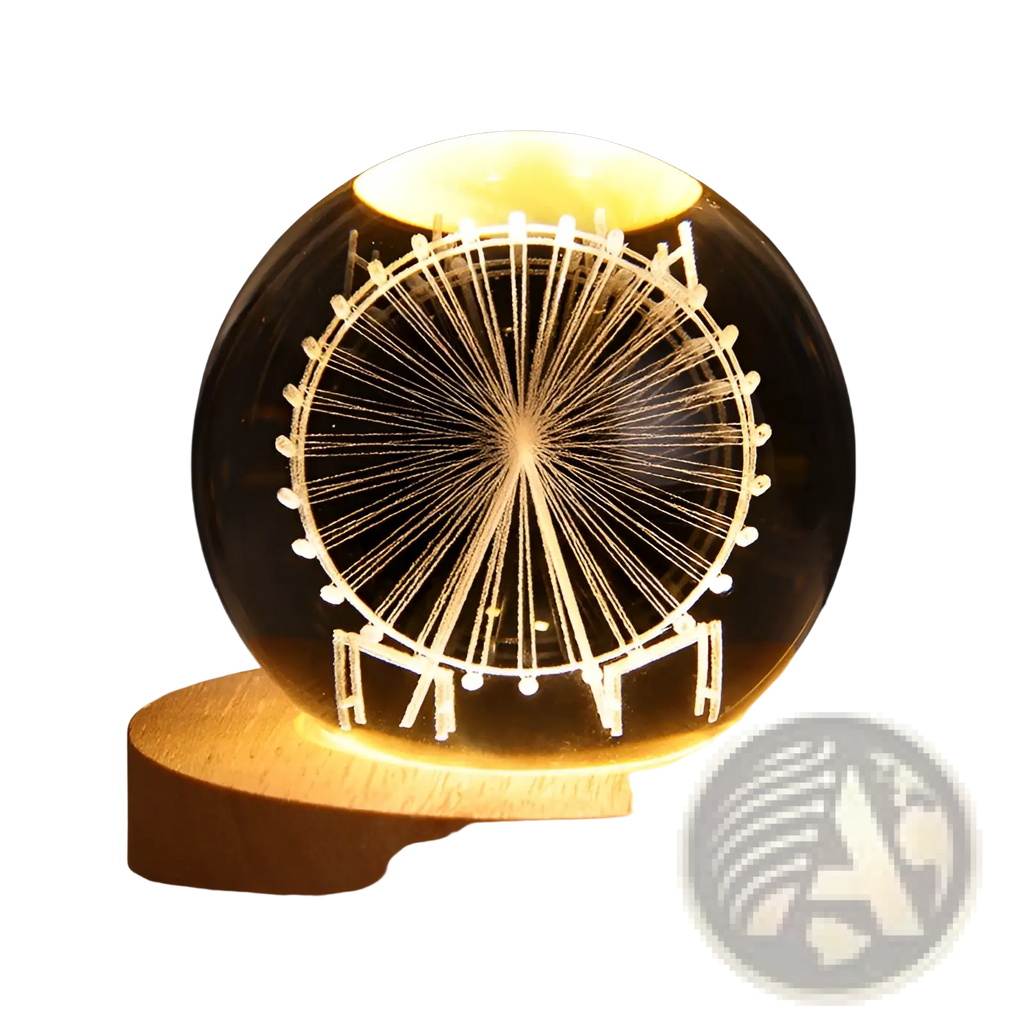 A warm glowing 3d galaxy crystal ball led night light moon lamp with a white ferris wheel etched on glass sphere