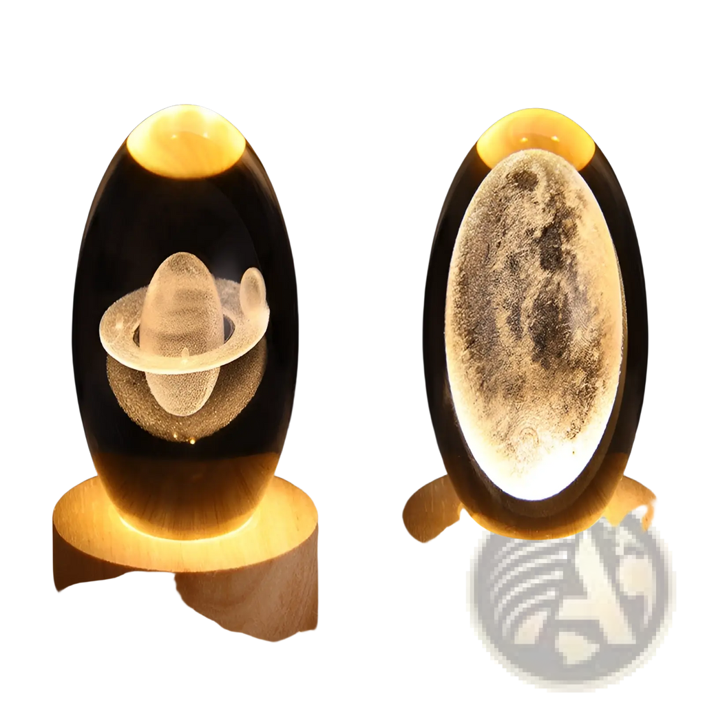 A warm-lit oval resin 3d galaxy crystal ball led night light moon lamp with a saturn design in clear glass and wood base