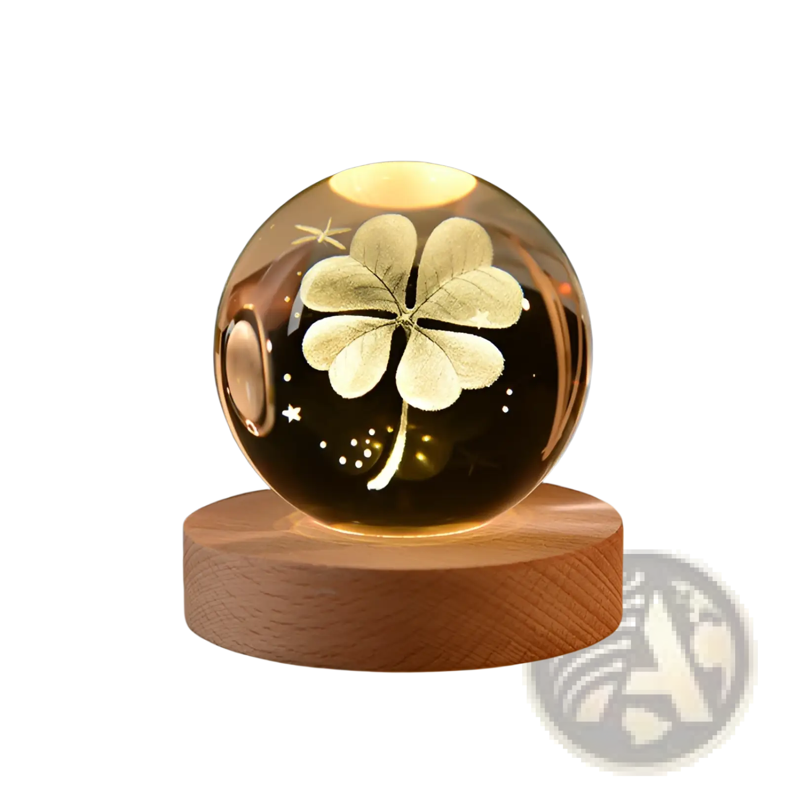 A glowing transparent crystal sphere with etched four-leaf clover and star patterns lit by warm LED light moon lamp