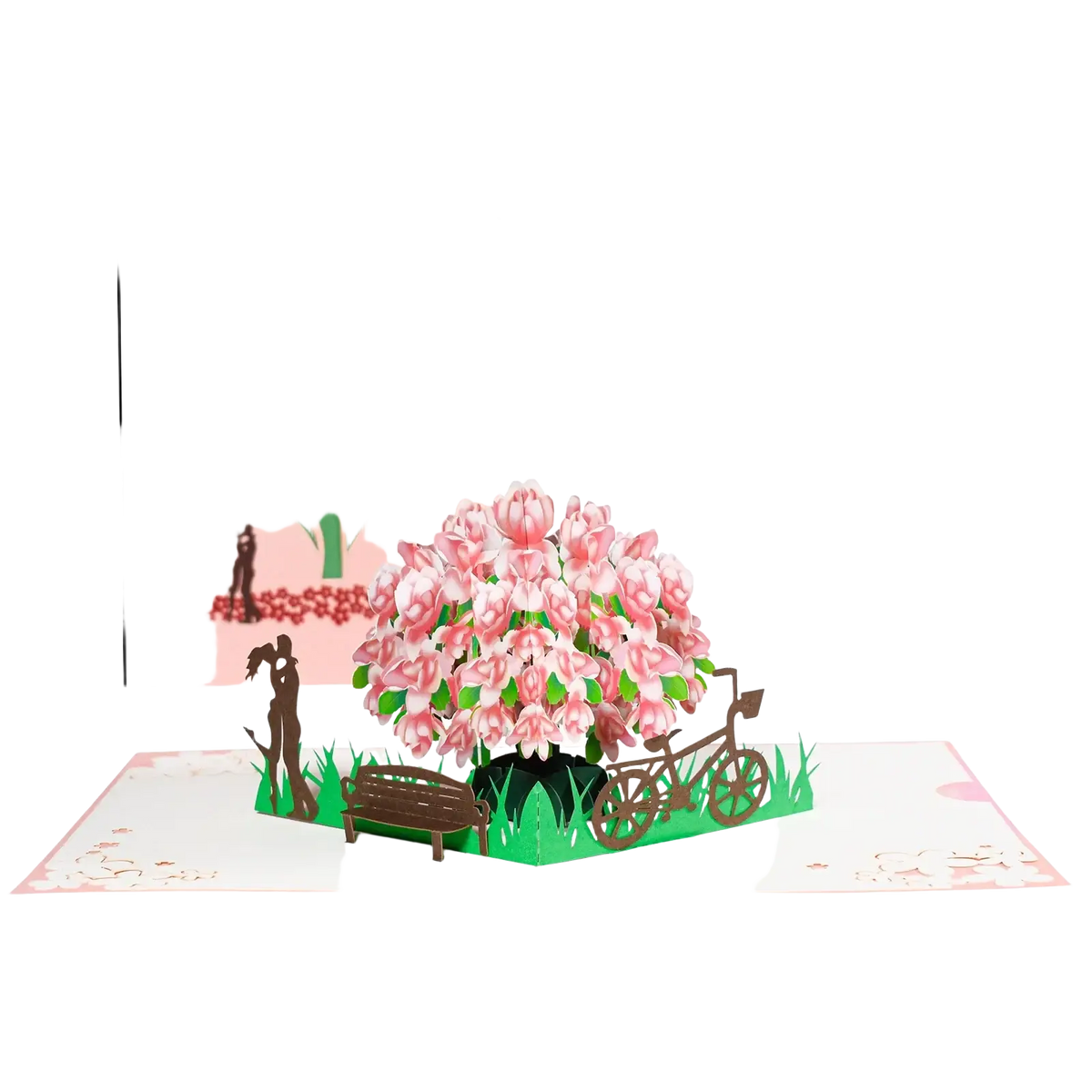 A pink 3d pop up valentine card featuring a detailed blossoming tree with layered petals and miniature park elements