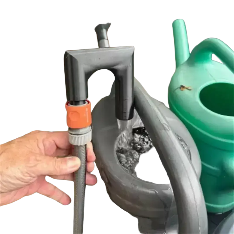 Black plastic 3d printed pla garden pump with orange connector and gray hose attachment for polylactic acid water flow
