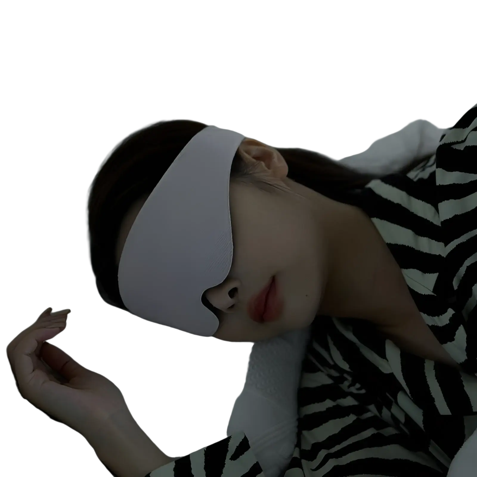 A person lying in bed wearing a white breathable 3d contoured fabric sleep mask for eye shading cover