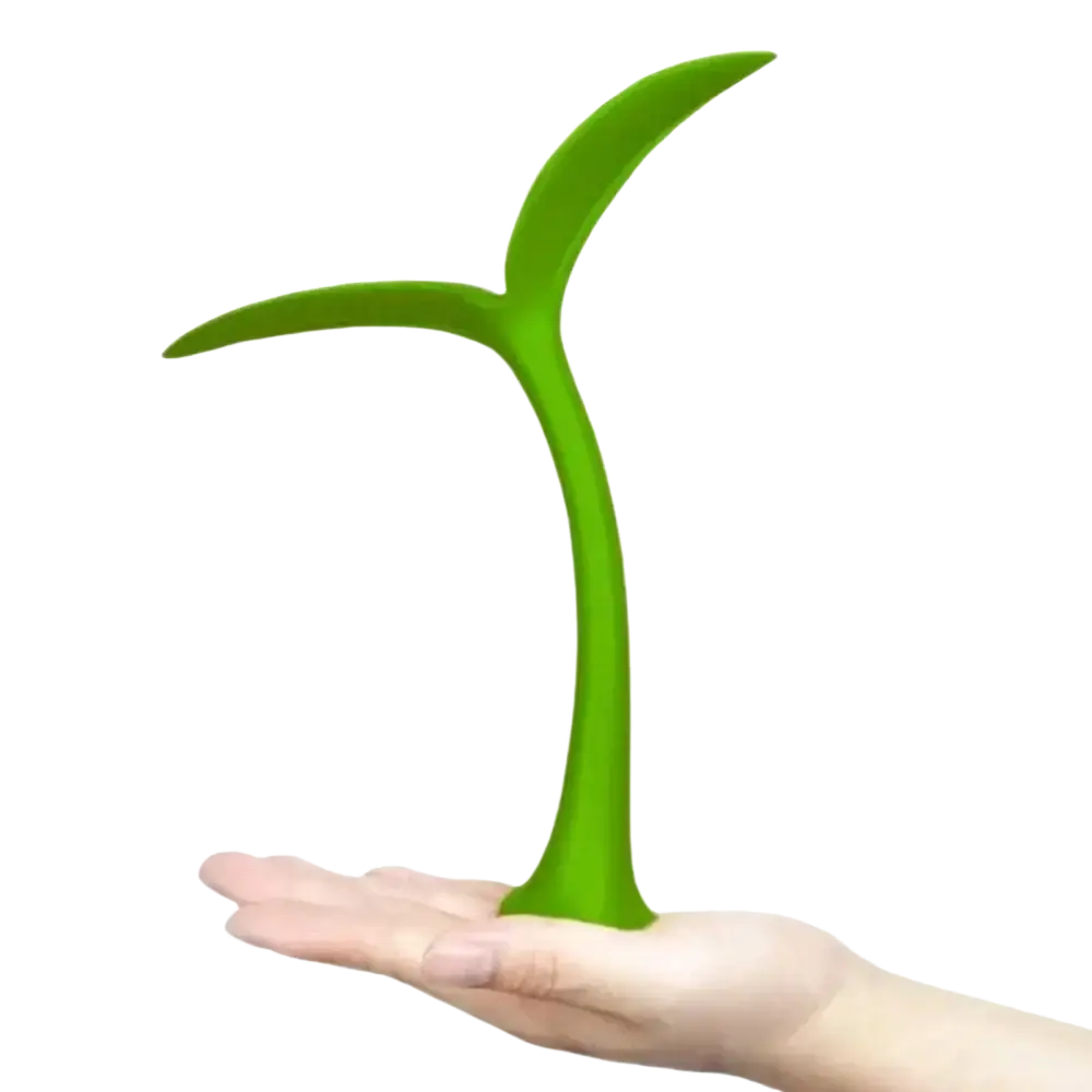 Green plastic desk lamp shaped like a tree sapling used as a car roof antenna decoration
