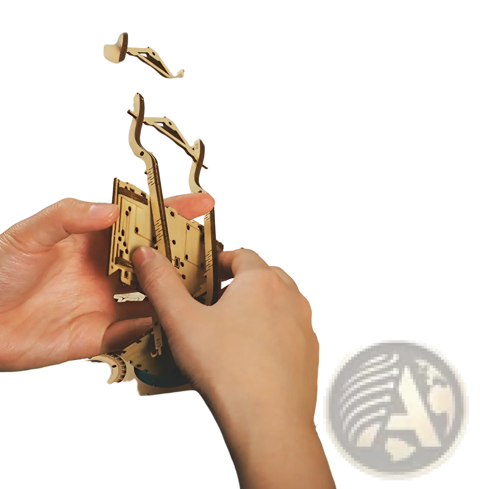 A hand holds a partially assembled natural wood 3d wooden train puzzle diy mechanical model kit showcasing gears