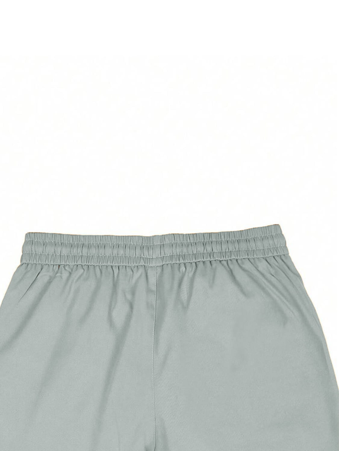 light gray slim fit tapered jogger pants with a smooth fabric and elastic waistband shown from the back.