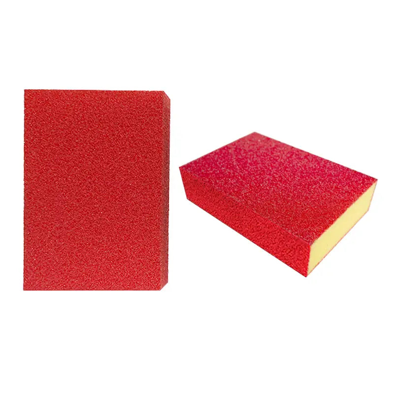 Nano emery sponge rust and stain remover tool with a red abrasive sanding block and yellow foam backing.