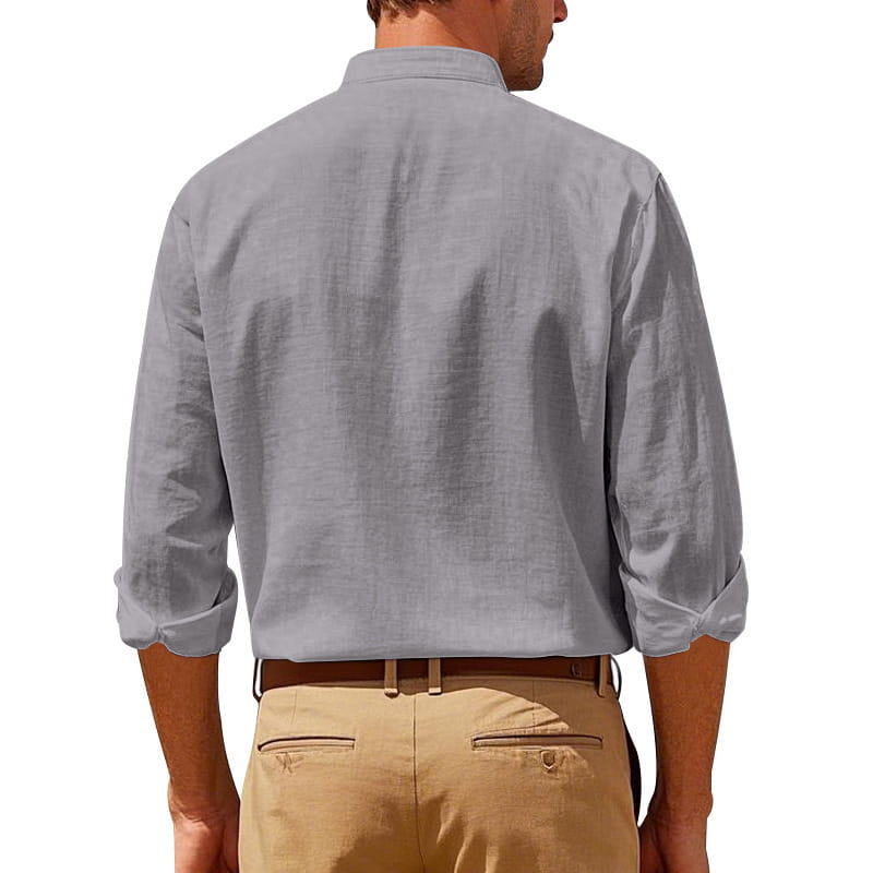 A light gray men’s casual linen long sleeve shirt with a stand collar, subtle textured weave, button-down front, and rolled cuffs.